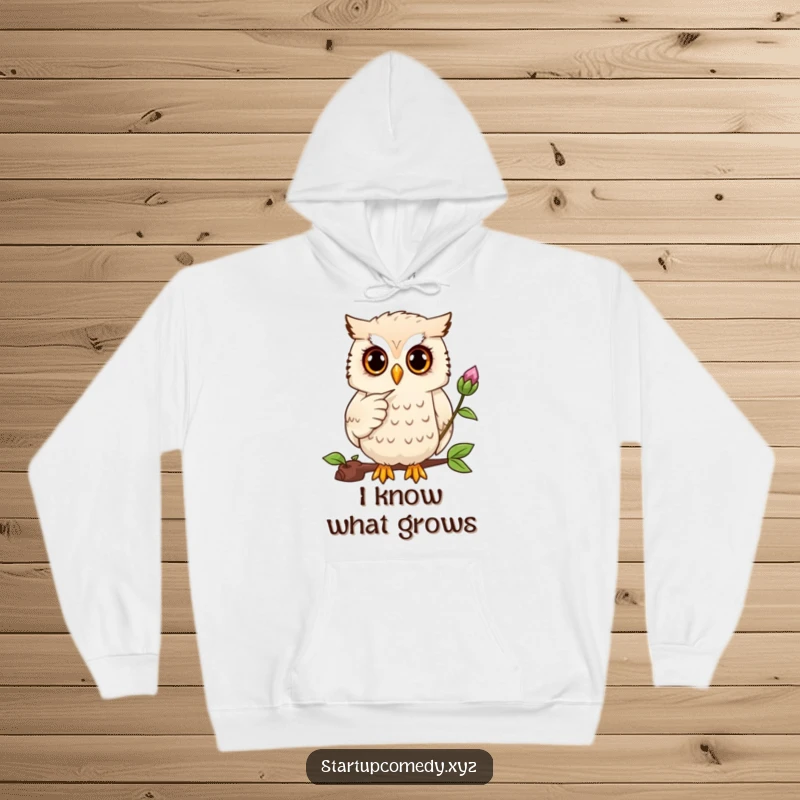 Funny owl hoodie, focused owl pointing at a seedling, cozy apparel, plant care wisdom gift.